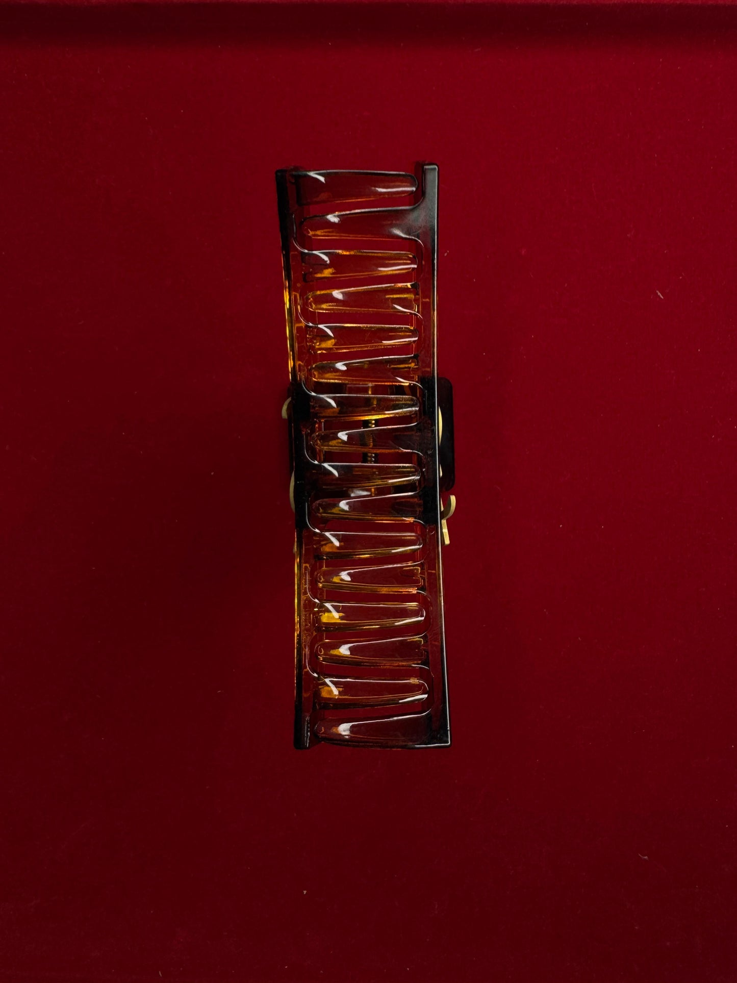 YSL Hair Clutcher – Iconic Luxury Redefined